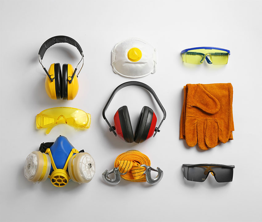 Flat lay composition with safety equipment on white background Flat lay composition with safety equipment on white background