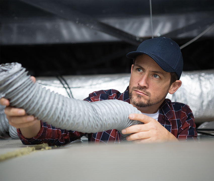HVAC Contractor Reviewing Essential Insurance Tips to Protect Their Business