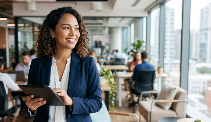 Businesswoman using tablet in office Businesswoman using tablet in office