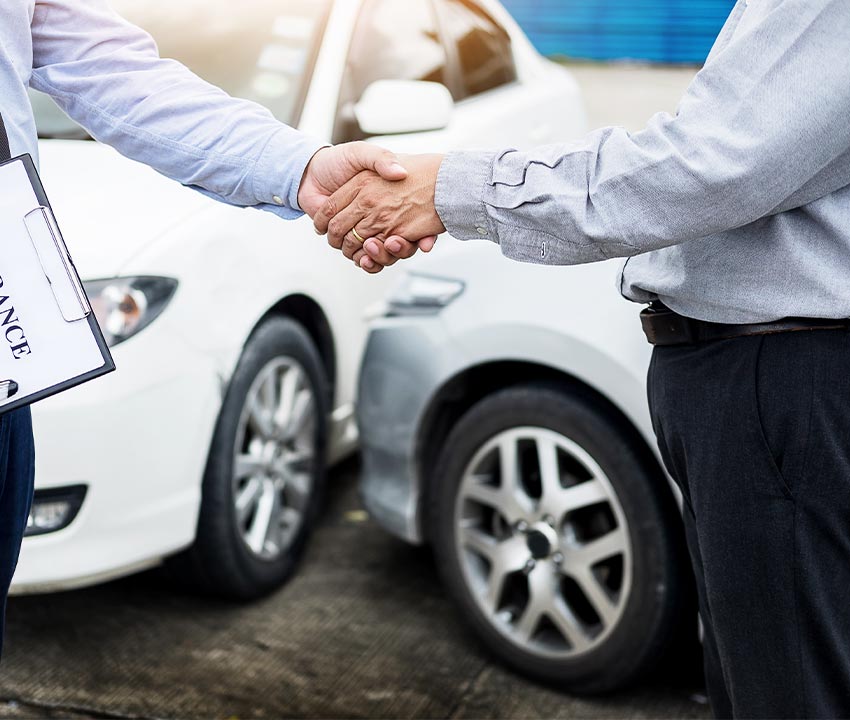 Customer and insurance agent hand-shaking