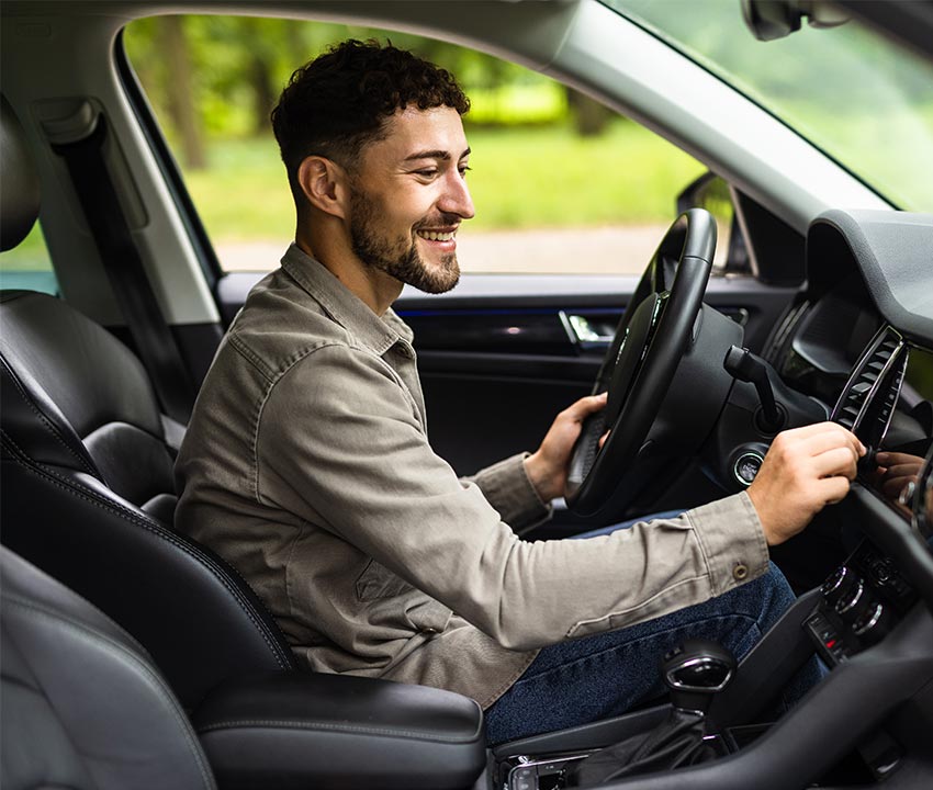 Man sitting on the car