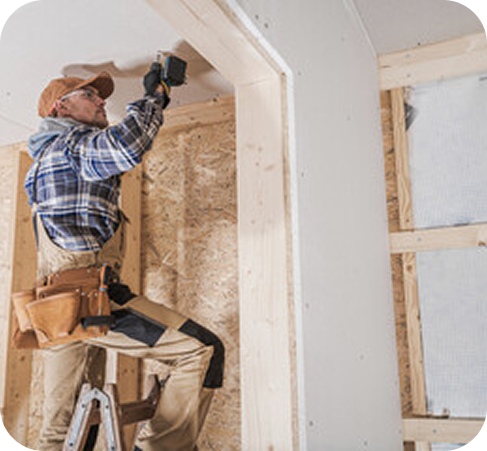 construction worker on ladder