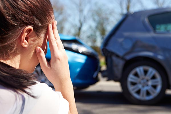 Woman tensed about her damaged car