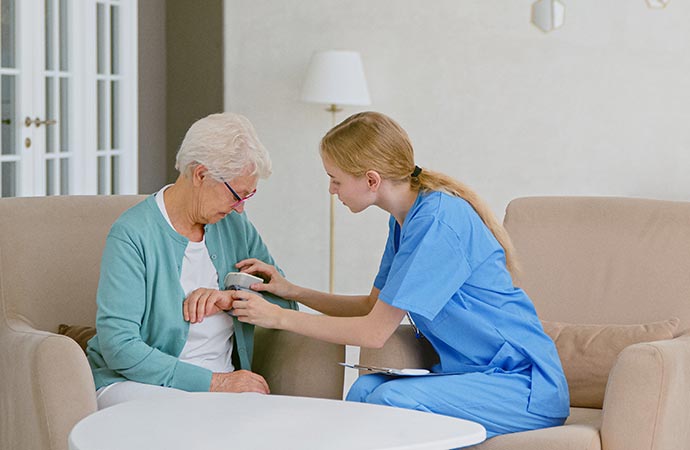 nurse taking care of a patient