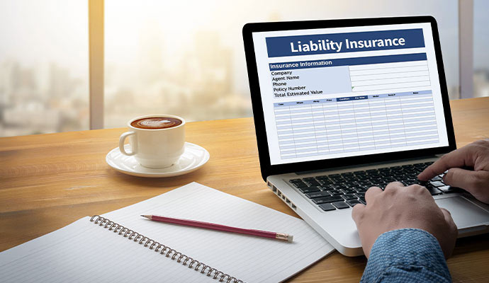 Laptop displaying a liability insurance form