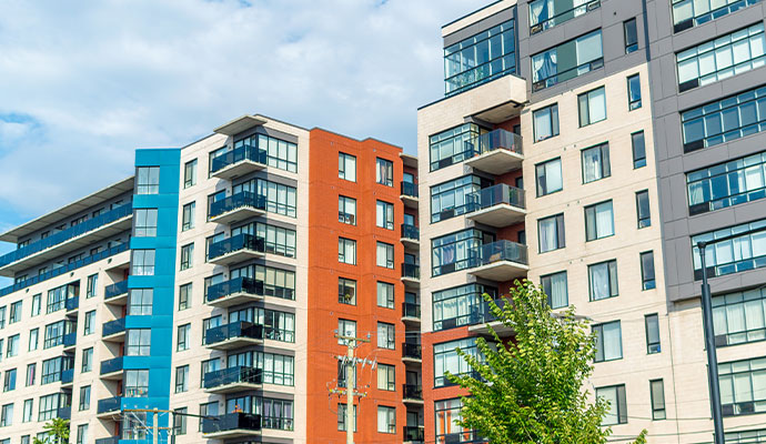 Modern multi-story condominium buildings with balconies Modern multi-story condominium buildings with balconies